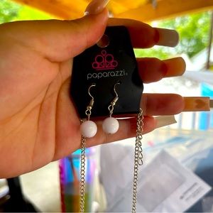 This is a long necklace with pearl earrings that come along with it!!